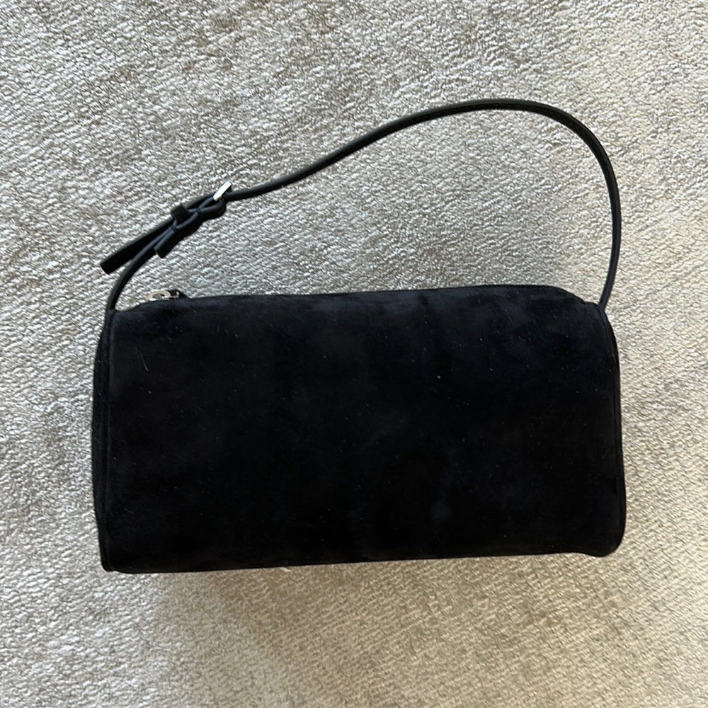 The row 90’s bag in black suede